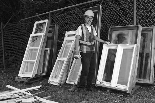 Professional team assessing furniture for clearance in Hainault