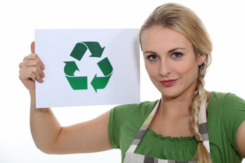 Workers sorting recyclable materials at a local transfer station